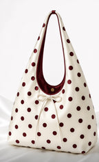 Red polka dot hobo bag