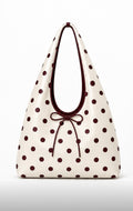 Red polka dot hobo bag